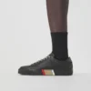 Adidași din piele cu detalii în dungi