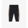 Pantaloni de jogging din bumbac cu bordură în carouri