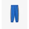 Pantaloni de jogging din bumbac cu bordură în carouri