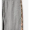 Pantaloni de jogging din bumbac cu borduri în carouri