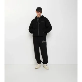 Pantaloni de jogging din bumbac cu logo cursiv în carouri