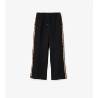 Pantaloni de trening din bumbac cu borduri în carouri Pantaloni de trening din bumbac cu borduri în carouri