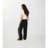 Pantaloni de trening din bumbac cu borduri în carouri Pantaloni de trening din bumbac cu borduri în carouri