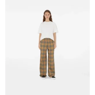 Pantaloni din bumbac cu model în carouri