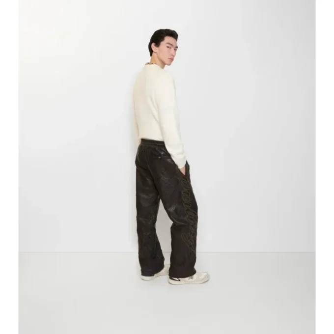 Pantaloni din piele cu logo cursiv