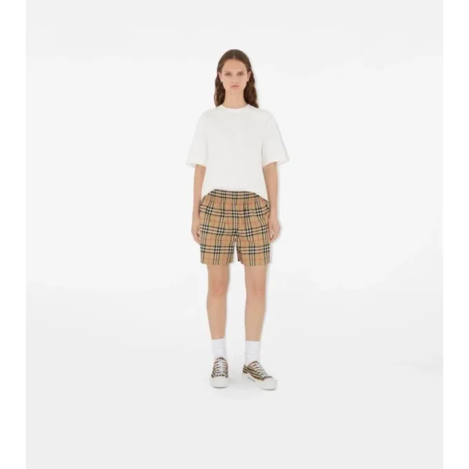 Pantaloni scurți din bumbac elastic cu imprimeu în carouri Pantaloni scurți din bumbac elastic cu imprimeu în carouri