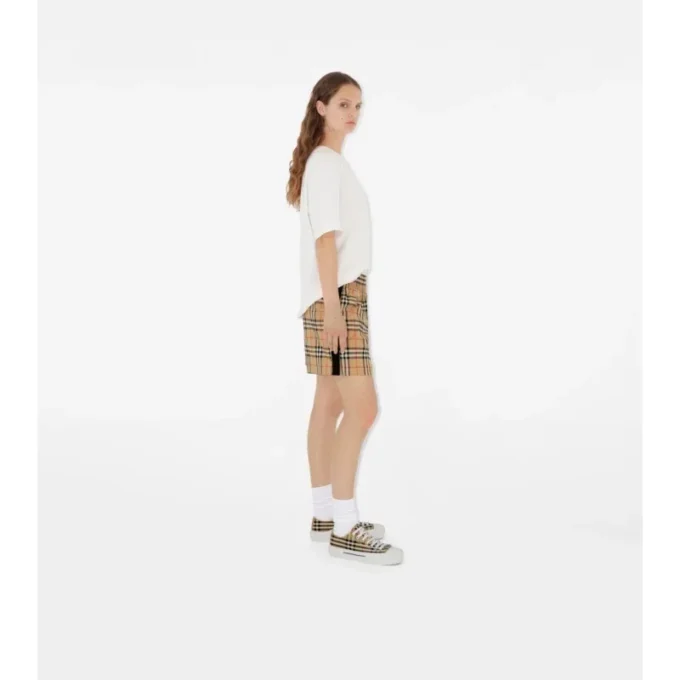 Pantaloni scurți din bumbac elastic cu imprimeu în carouri Pantaloni scurți din bumbac elastic cu imprimeu în carouri