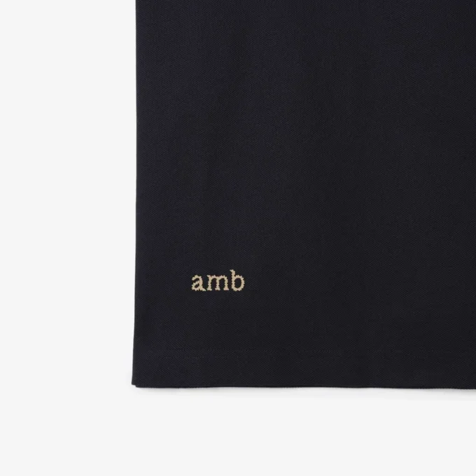 Tricou polo din bumbac EKD cu broderie în cruciulițe